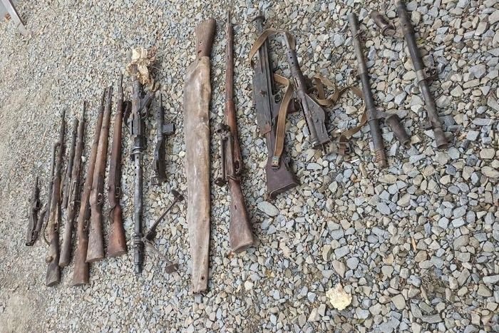 Builders find stash of WWII weapons during renovation of historic house